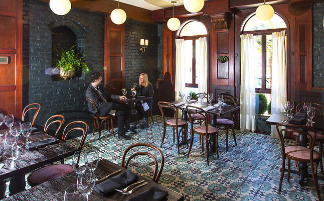 44ec6c0a-2ff6-11e5-8913-4ebf8765dfab-780x483 - Opened in 1908, the Sorrento Hotel, is a local landmark that has undergone a makeover. The renovation includes a remodeled restaurant, now called  the Dunbar Room. Jared Lovejoy, left, and Jena Thornton, are the designers responsible for the remodel. The remodel includes improved lighting and a new floor with tiles from Morocco.